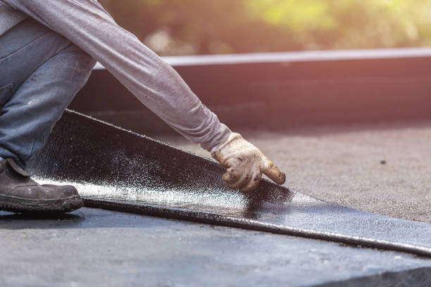 Professional Waterproofing technician working in Sterling, VA